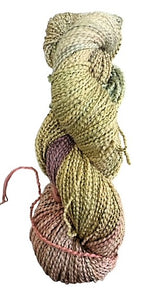 Marshgrass beaded cotton/rayon yarn with broken thread