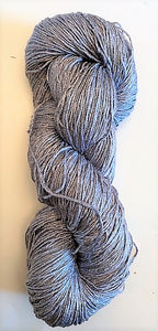 Silver rayon metallic yarn with broken thread